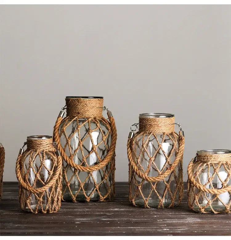 Decorbites™ rustic hanging glass vase with clear glass, woven twine handles, and decorative netting as hanging glass vase