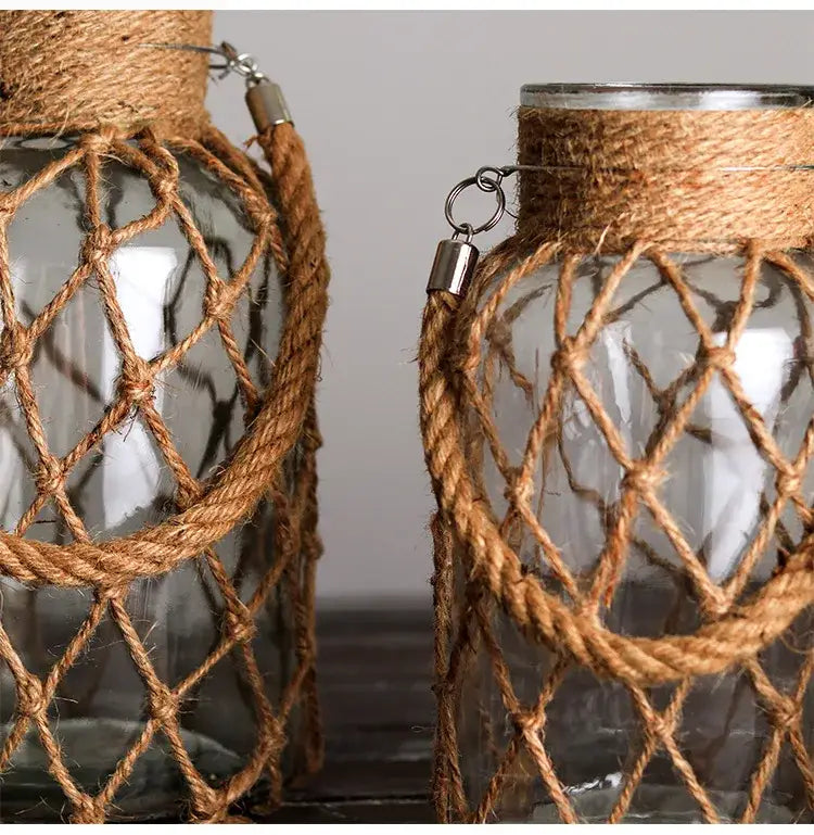 Decorbites™ rustic hanging glass vase with clear glass, hemp rope netting, and metal hardware accents