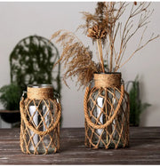 DecorBites™ rustic hanging glass vase with hemp rope wrapped twine and metal handles for hanging glass decor