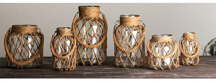 Set of six DecorBites rustic hanging glass vases with mesh detailing and woven natural twine hemp rope handles
