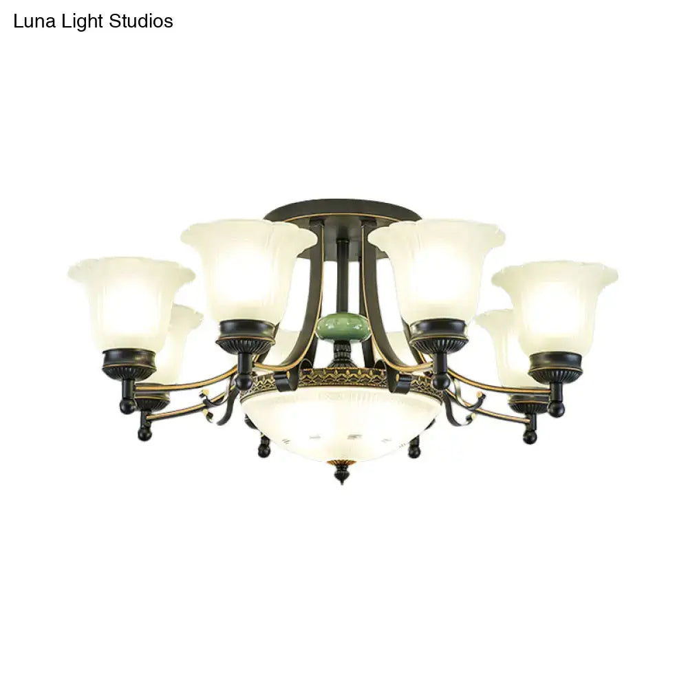 Antique brass ceiling light fixture with six frosted glass shades and central green jade accent for living room