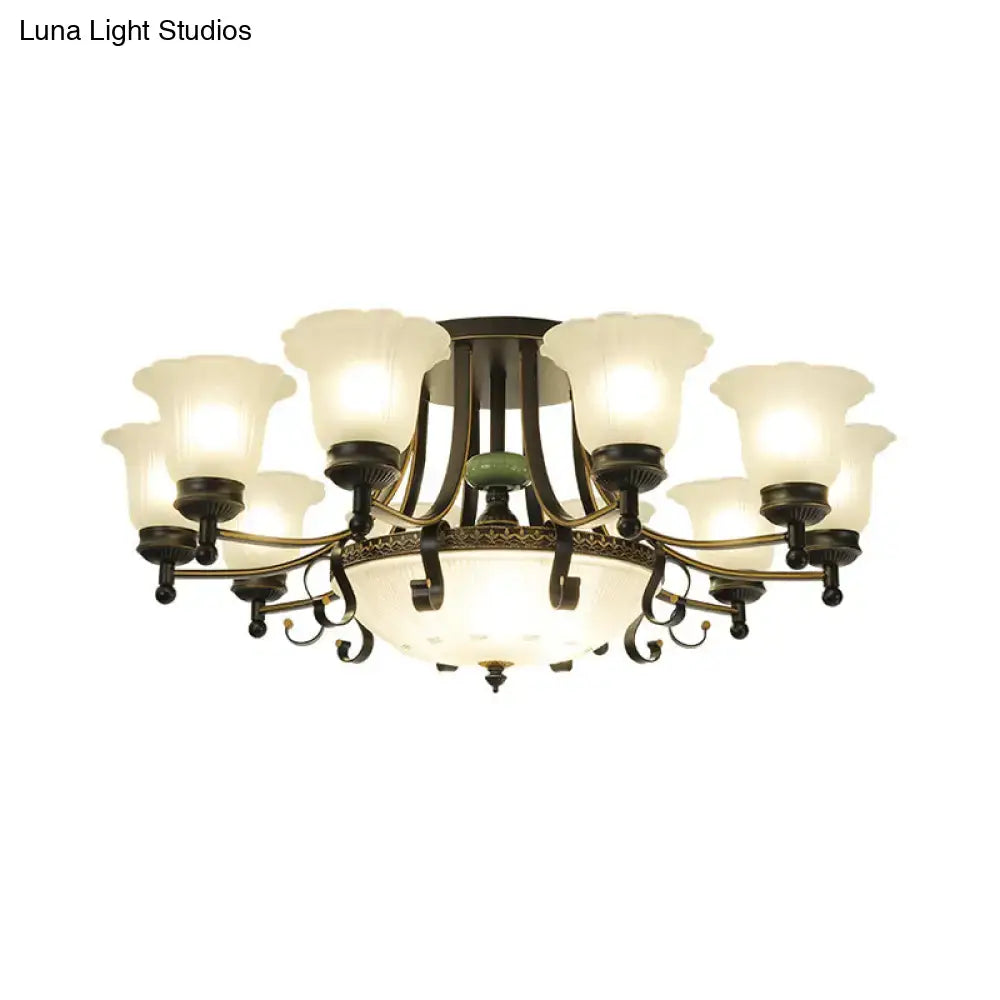Antique brass ceiling light fixture with eight frosted opal glass shades and ornate central design by DecorBites