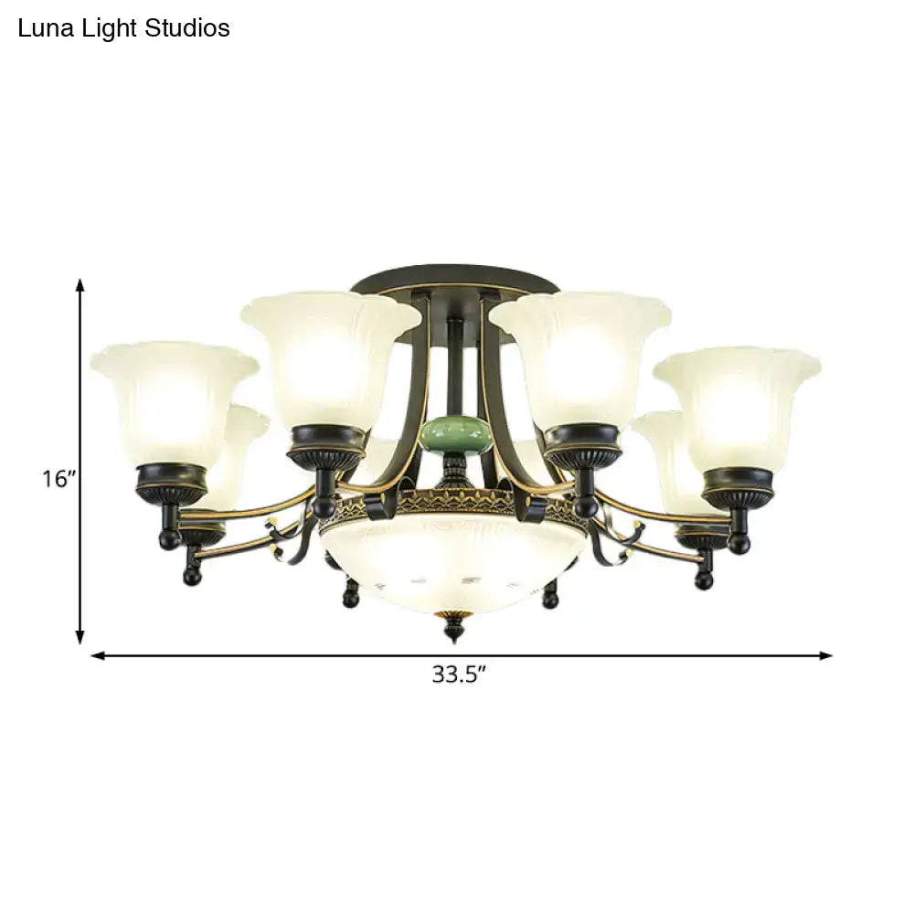 Antique brass ceiling light fixture with six frosted opal glass shades and green accent for living room use