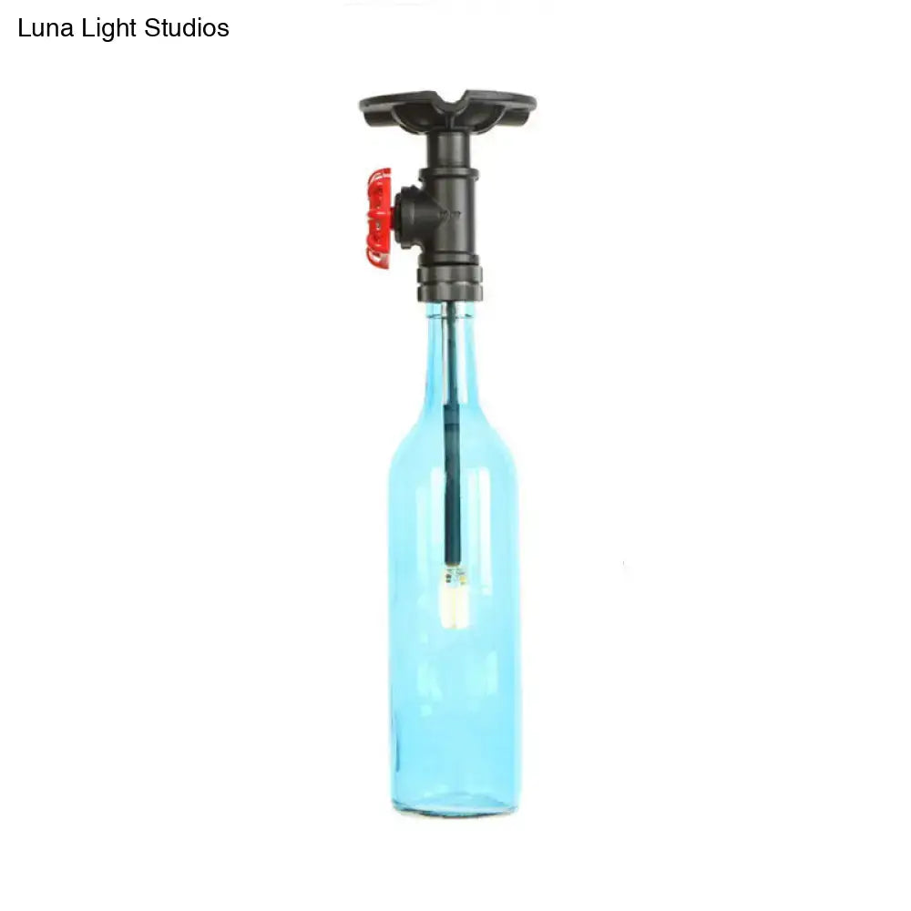 Decorbites™ rustic single light semi flush lamp featuring a translucent blue glass bottle with black valve and red handle