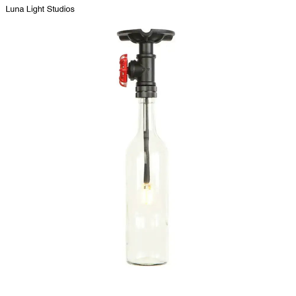 Clear glass bottle semi flush light with black pipe valve and red handle featuring exposed filament bulb by decorbites