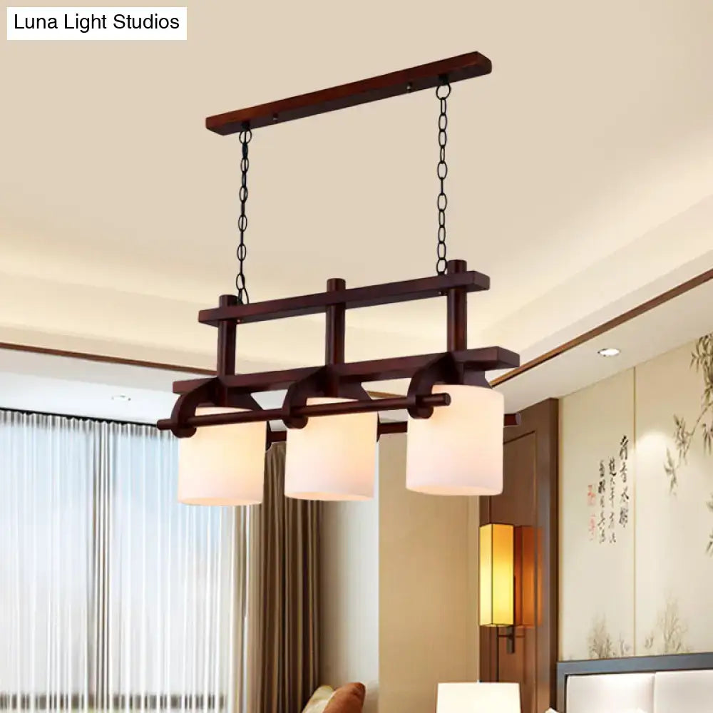 Decorbites rustic white glass island light with three frosted shades and dark wood pendant for dining room use
