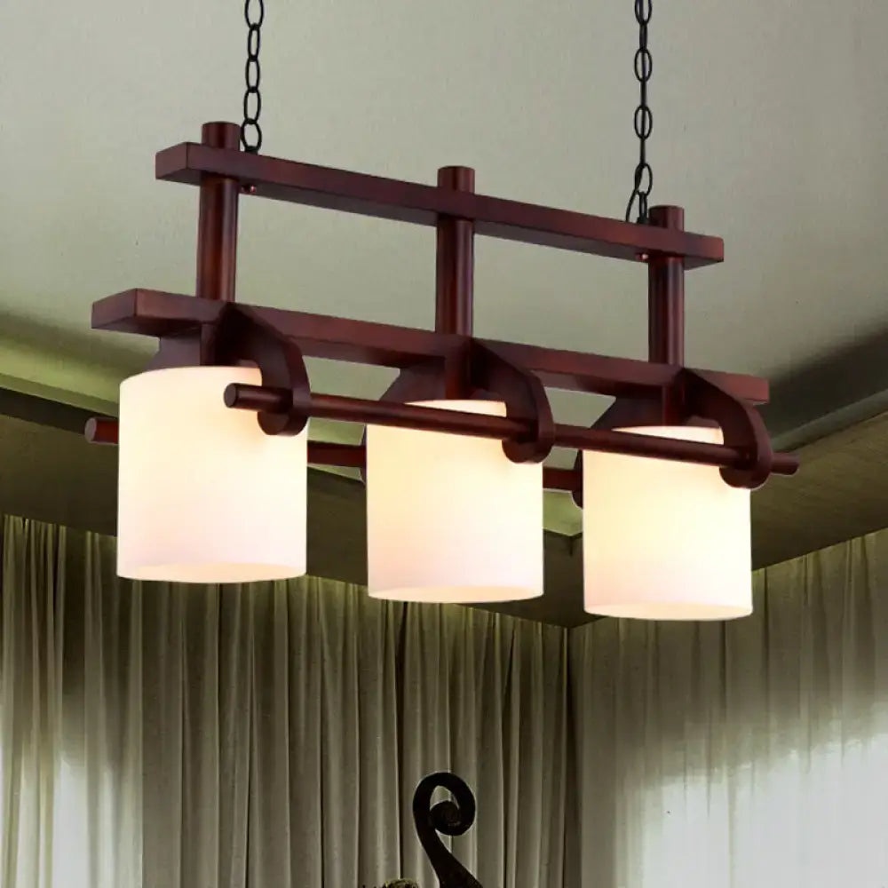 DecorBites™ rustic white glass island light with dark wood frame and three frosted shades for dining room use