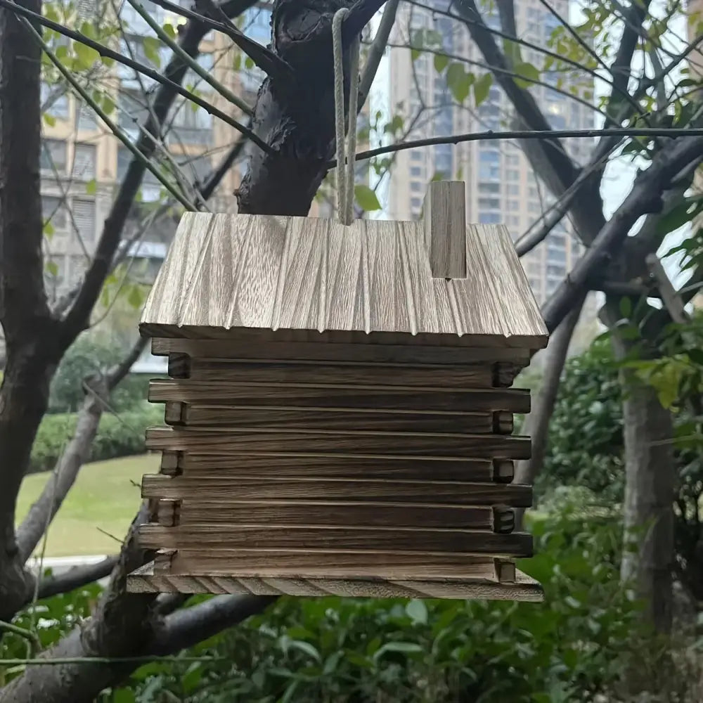 DecorBites™ rustic wooden birdhouse with slanted roof and log-style panels hanging for small birds