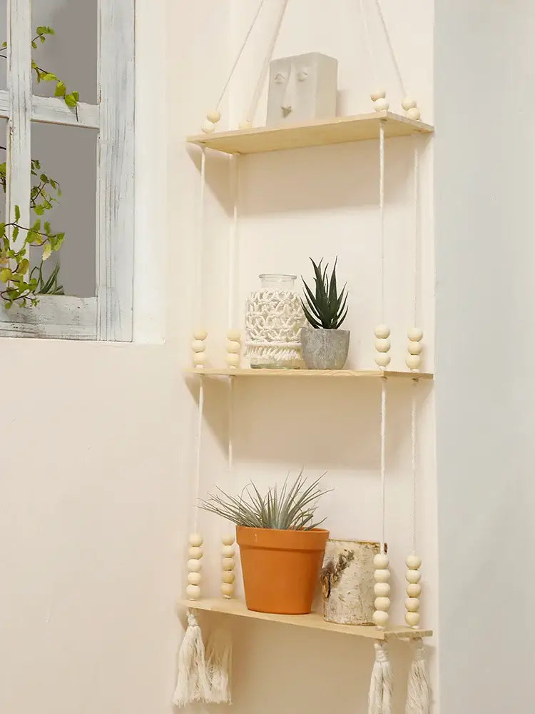 Decorbites™ rustic wooden wall shelf with three-tier hanging wooden wall shelf featuring beaded accents and tassels