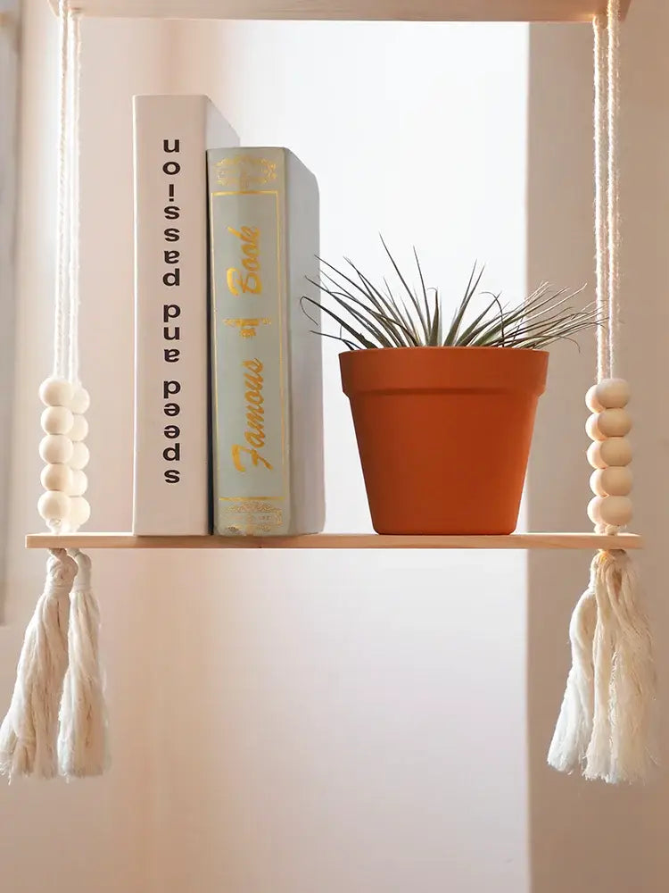 Decorbites™ rustic wooden wall shelf with macrame cords holding a terracotta pot and small air plant