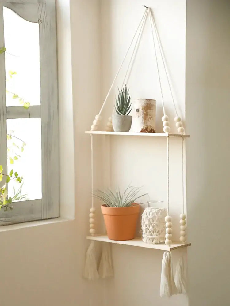 DecorBites™ rustic wooden wall shelf with two-tiered light wood design and white macrame cords for hanging plant storage