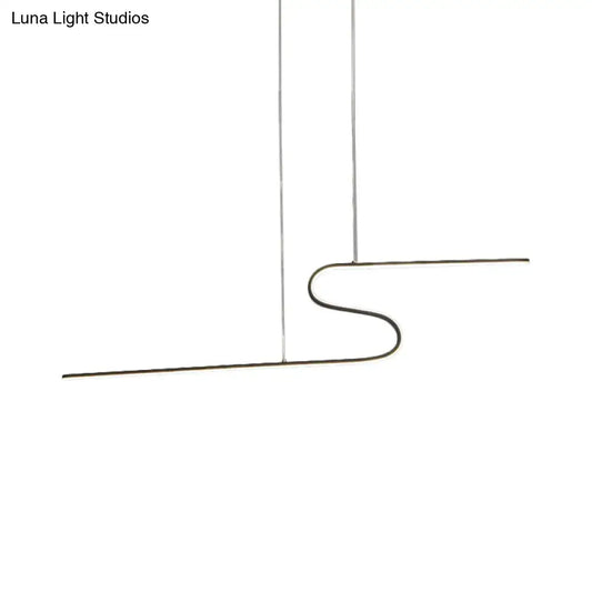 Minimalist black linear pendant light by decorbites featuring sleek metal design and warm white light for modern spaces