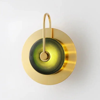 Decorbites™ scandinavian brass wall sconce with a gold-toned circular frame and textured gradient green and black disc premium brass wall sconce