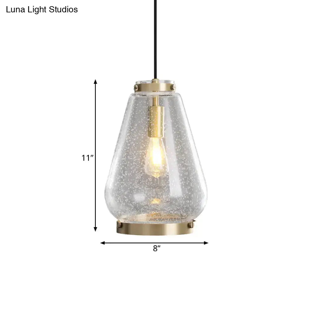 DecorBites™ seeded glass pendant light with clear speckled glass shade and brass rim ideal for bedrooms
