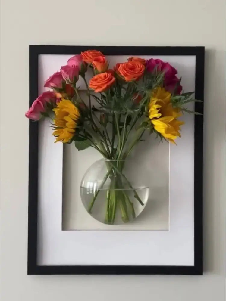 DecorBites™ self-watering glass terrarium set with vibrant pink orange yellow roses and sunflowers in spherical vase