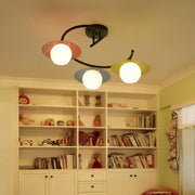 Decorbites™ semi flush light with modernist red yellow blue glass and pastel saucer shades in black spiral design