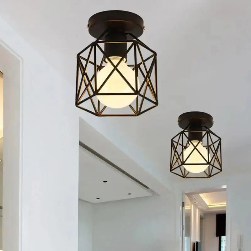 Decorbites™ semi flush mount light with black geometric metal frame and warm glowing bulb inside for indoor use