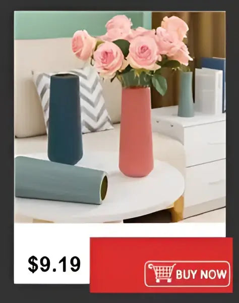 A sleek modern ceramic flower vase in soft coral with smooth ridges displayed alongside decorbites shatterproof clear acrylic flower vase