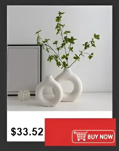 White ceramic flower vase with sleek modern design of two interlocking circles for DecorBites™ shatterproof clear acrylic vase