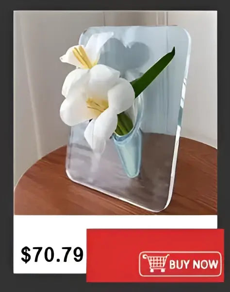 Decorbites shatterproof clear acrylic flower vase holding a white lily with yellow center in a clear acrylic flower vase