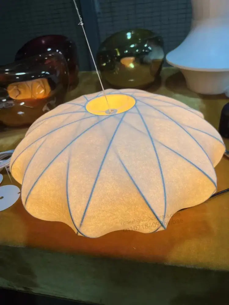 DecorBites silk led pendant lamp in cream fabric with blue geometric lines and a yellow circular center design