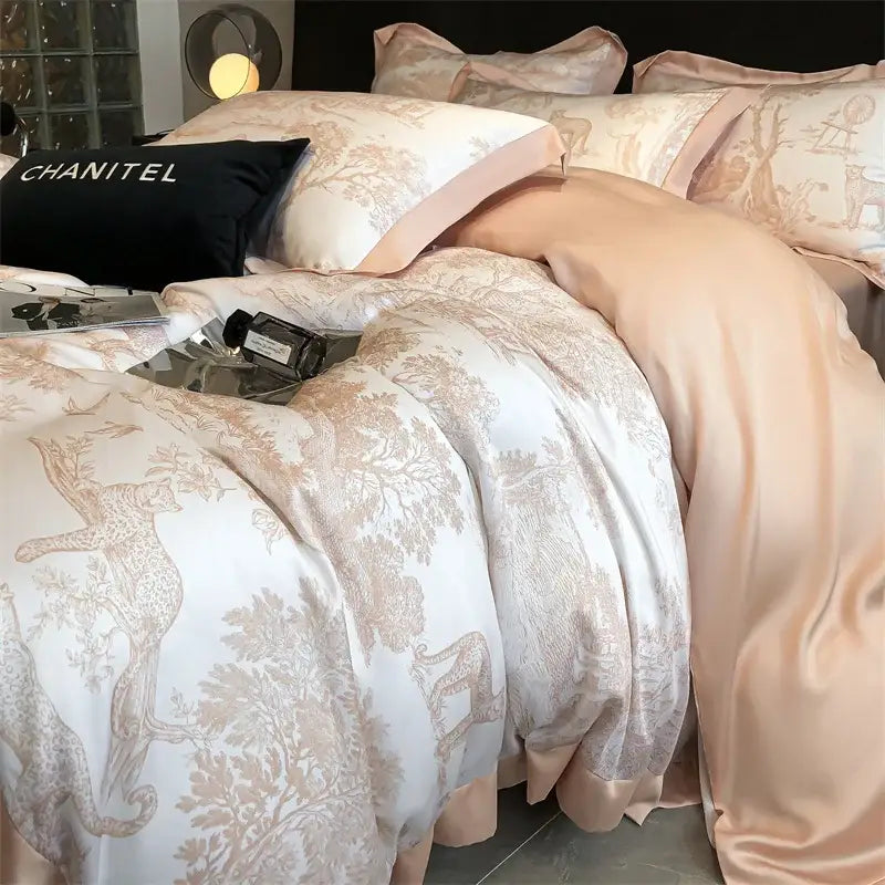 Decorbites silky eucalyptus fiber duvet cover set in peach and cream with toile leopard and foliage pattern