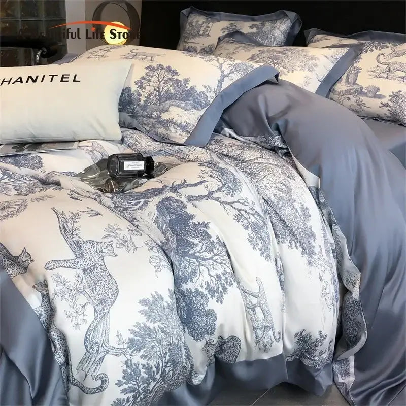 Blue and white toile-patterned satin duvet cover set with subtle sheen made of silky eucalyptus fiber by DecorBites
