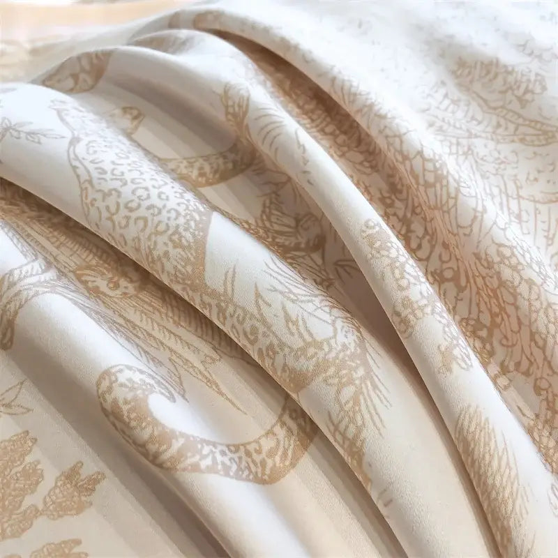 Cream-colored eucalyptus fiber duvet cover with delicate gold-toned stylized birds and foliage print from decorbites forest leopard set