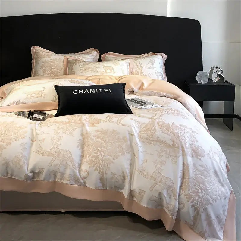 Cream-colored satin duvet cover set with beige animal and foliage pattern and peach piping made from silky eucalyptus fiber