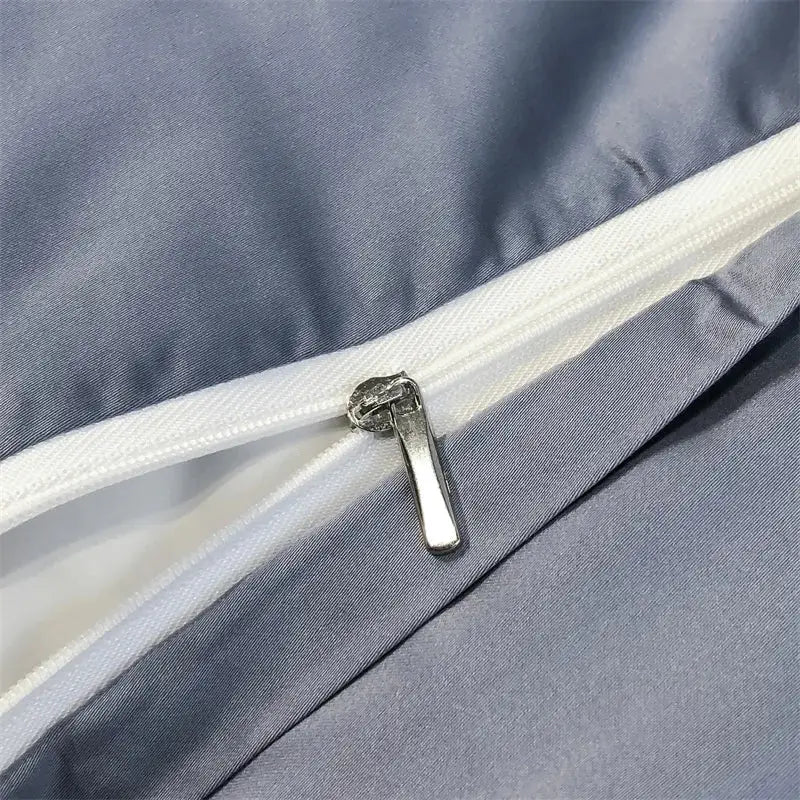 Silver zipper with metallic pull tab on soft gray eucalyptus fiber duvet cover from decorbites™ silky bedding set forest leopard