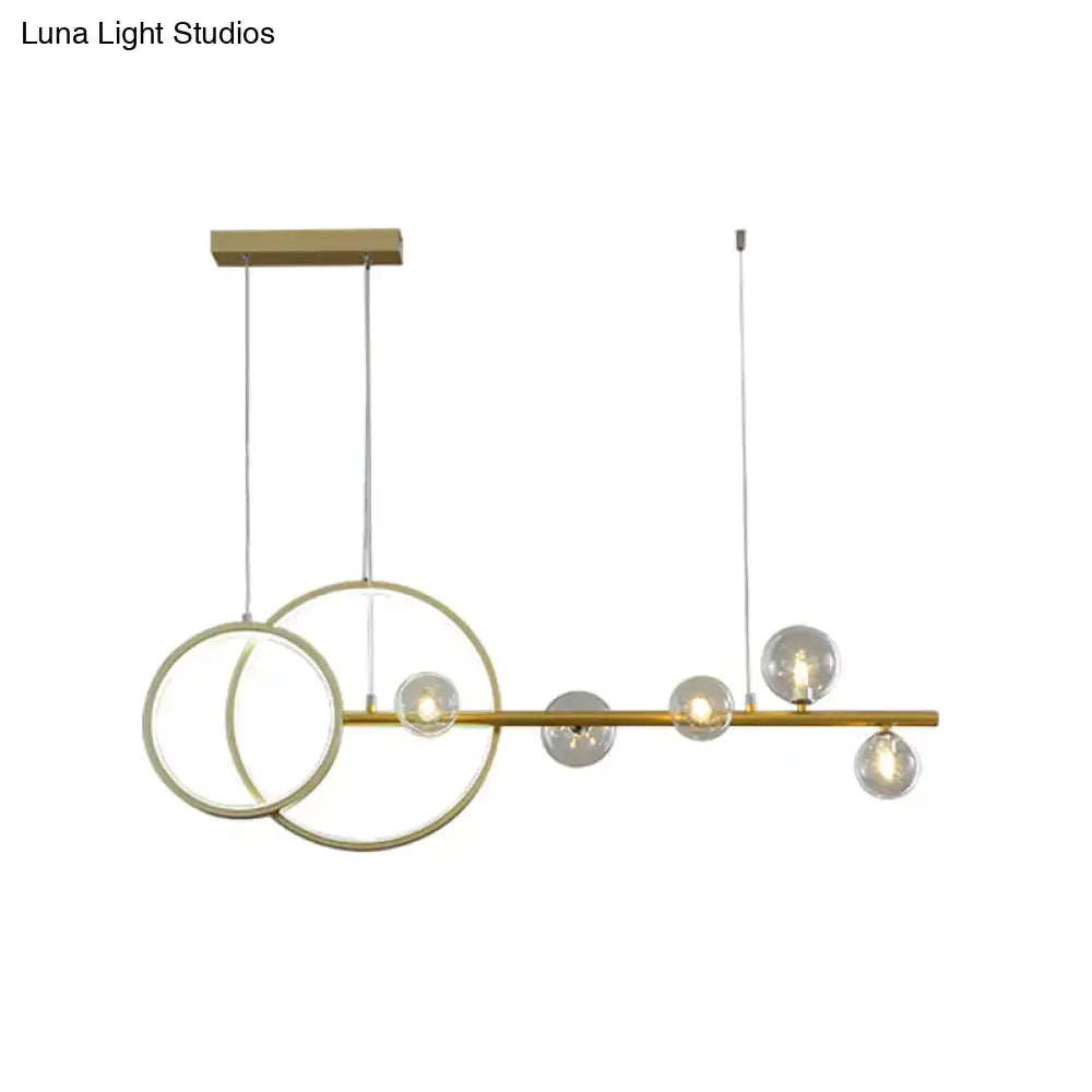 DecorBites simple 5-head LED ceiling light fixture in gold with clear glass sphere bulbs and intersecting rings design