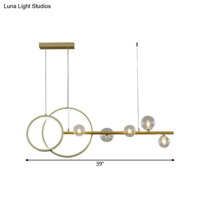 DecorBites™ gold ceiling light fixture with five LED clear glass sphere bulbs and intersecting circular rings