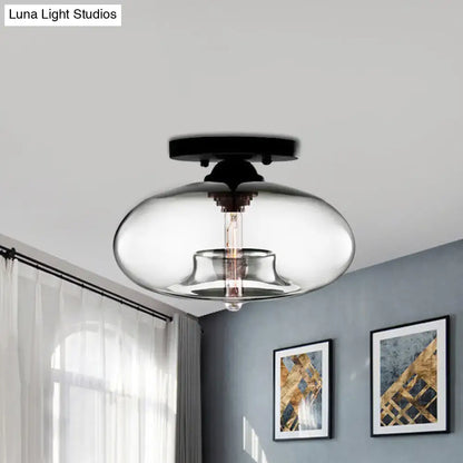 Modern glass pendant light with black metal base and exposed edison bulb for decorbites™ glass oval flush mount