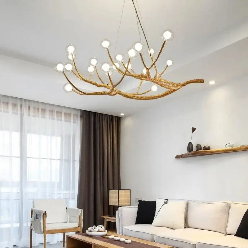 Antique brass iron tree branch chandelier with multiple spherical glass bulbs by DecorBites™ for elegant lighting