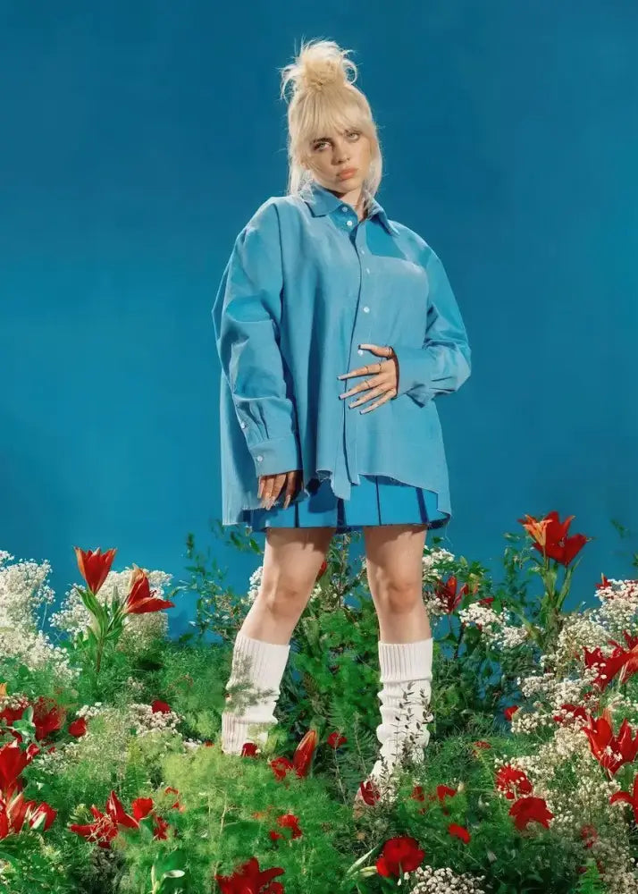 Blue oversized button-up shirt with relaxed fit and asymmetrical hemline featured in decorbites™ singer b-billies canvas art print
