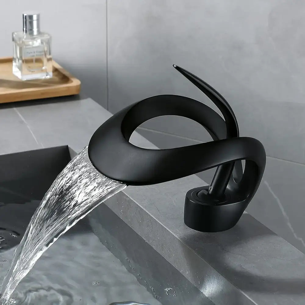 Black matte single handle bathroom sink faucet with modern waterfall design by decorbites for bathroom sink use