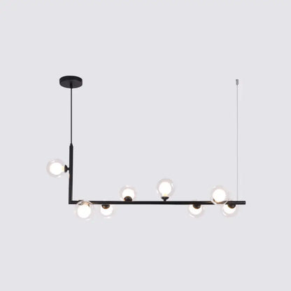 DecorBites sleek black metal pendant light with six clear glass globes for dining room hanging island design