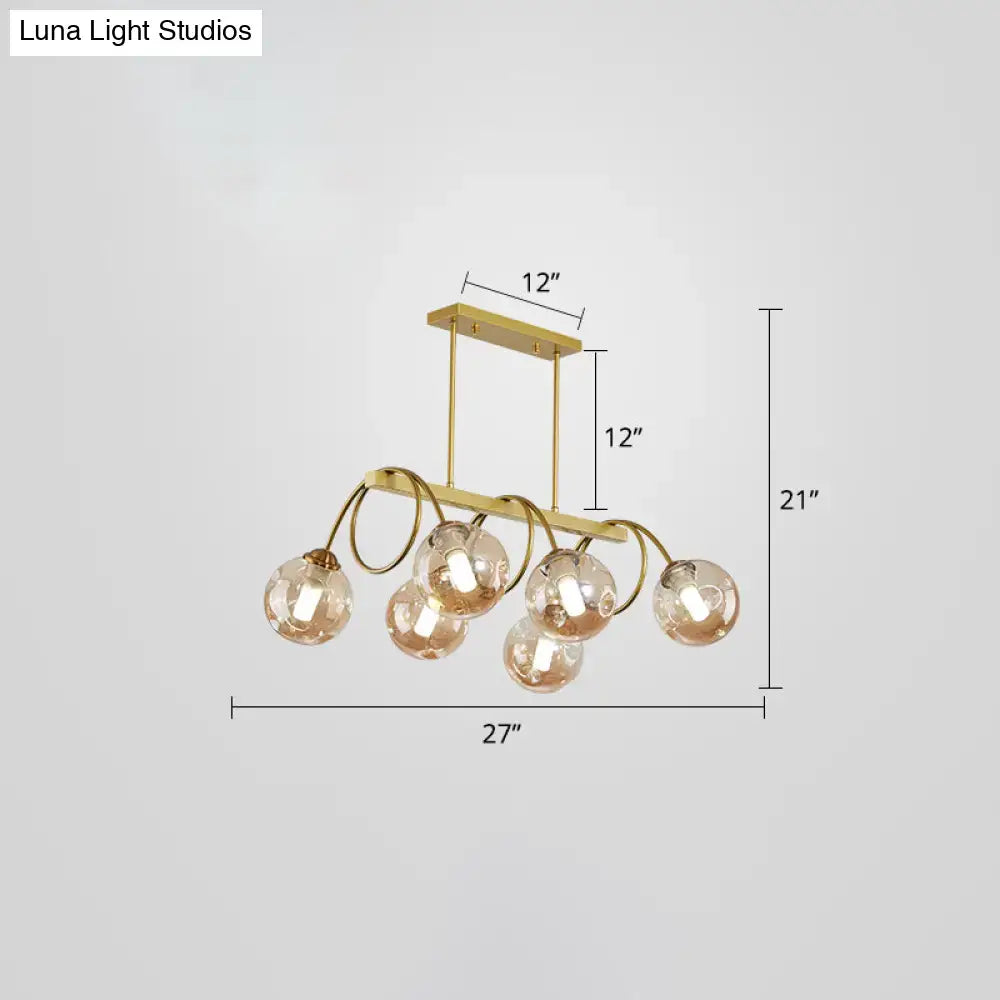 Decorbites sleek gold spiral island light with gold finish metal frame and five spherical glass globe shades