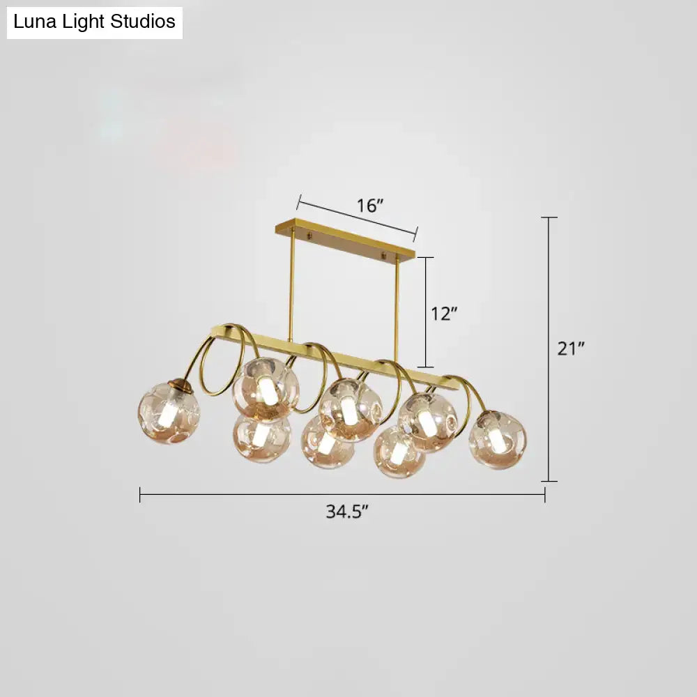 Decorbites sleek gold spiral island light with gold finish metal frame and seven spherical glass bulbs hanging ceiling lamp