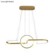 Gold-finished DecorBites™ pendant light with sleek interlocking metal rings for a minimalistic curve dining room design