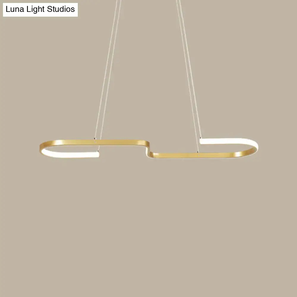 DecorBites sleek ring and curve dining room pendant light in gold-toned metal with integrated LED lighting for modern dining room