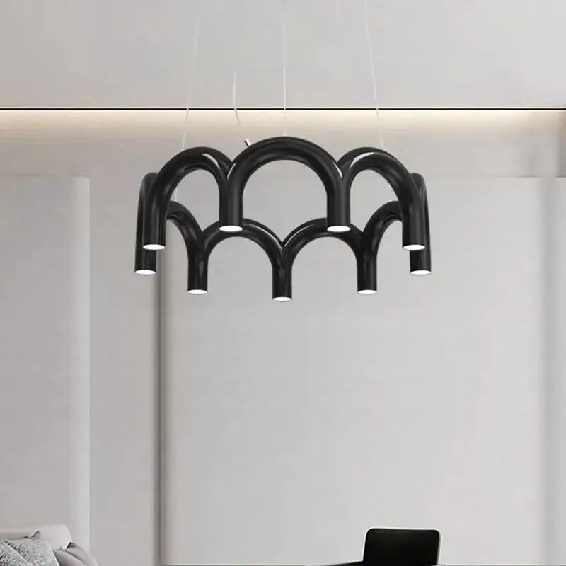 Black modern u-shaped chandelier by decorbites with curved arching arms and integrated lighting for bedroom and kitchen
