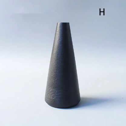 DecorBites™ sleek matte black ceramic small vase with tapered conical shape and subtle ridges for elegant Japanese home decor