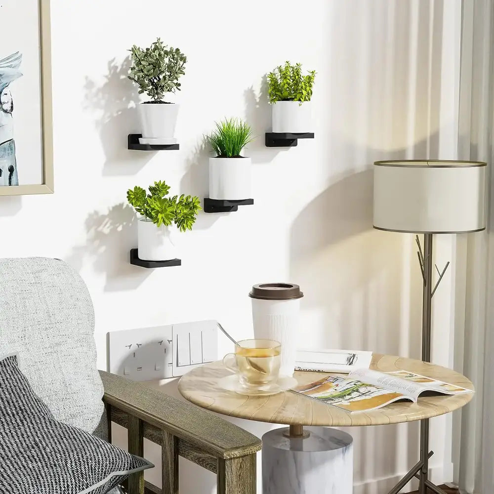 Decorbites™ small wood floating shelves 4-pack with black metal wall shelves holding white ceramic planters and plants