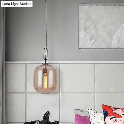 DecorBites™ warm-toned amber cognac glass pendant lamp with sleek black metal chain for industrial ceiling lighting