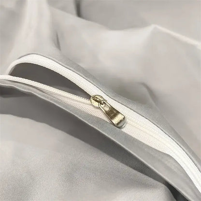 Silver-toned zipper with metallic pull tab on soft white egyptian cotton duvet cover from decorbites 1000tc bedding set