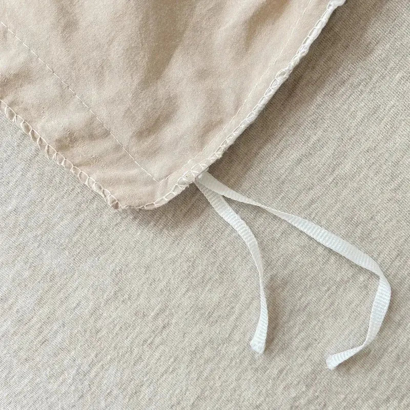 Beige linen duvet cover with white ribbed drawstrings and delicate lace trim in decorbites™ soft japanese style pcs duvet cover set