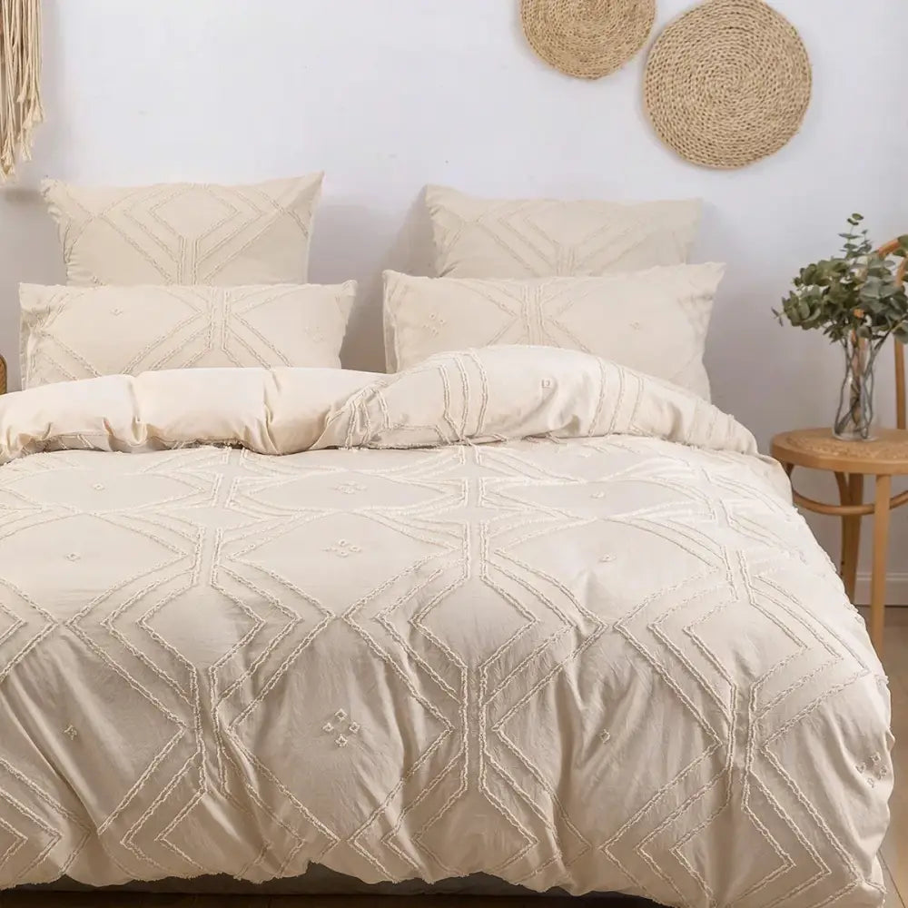 Beige quilted duvet cover set with geometric embroidery and frayed texture in soft tufted microfiber by DecorBites