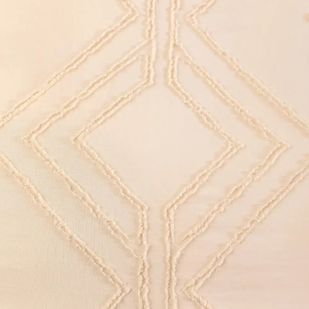 Cream-colored microfiber duvet cover set with textured geometric diamond embroidery in the DecorBites™ Soft Tufted collection