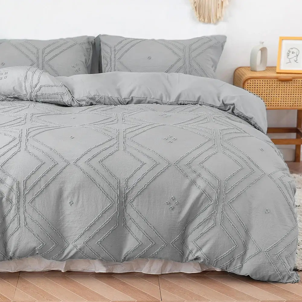 Gray quilted duvet cover set with geometric embroidery in soft tufted microfiber by DecorBites